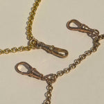 Antique and vintage Albert clasps in solid gold