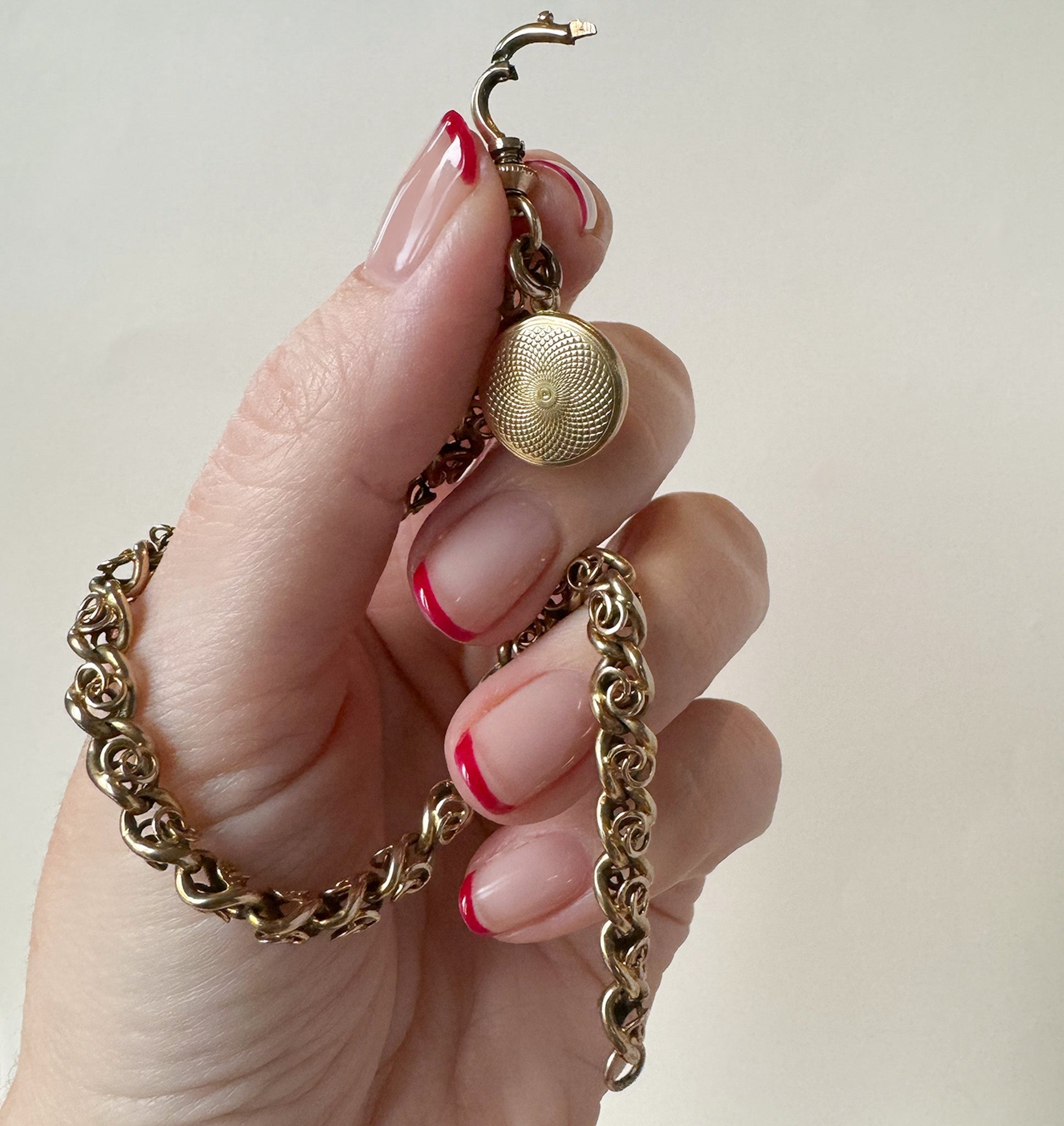 Everyday antique gold locket bracelet