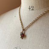 Bringing Love, Cherub and Garnet Charm, 9ct Gold