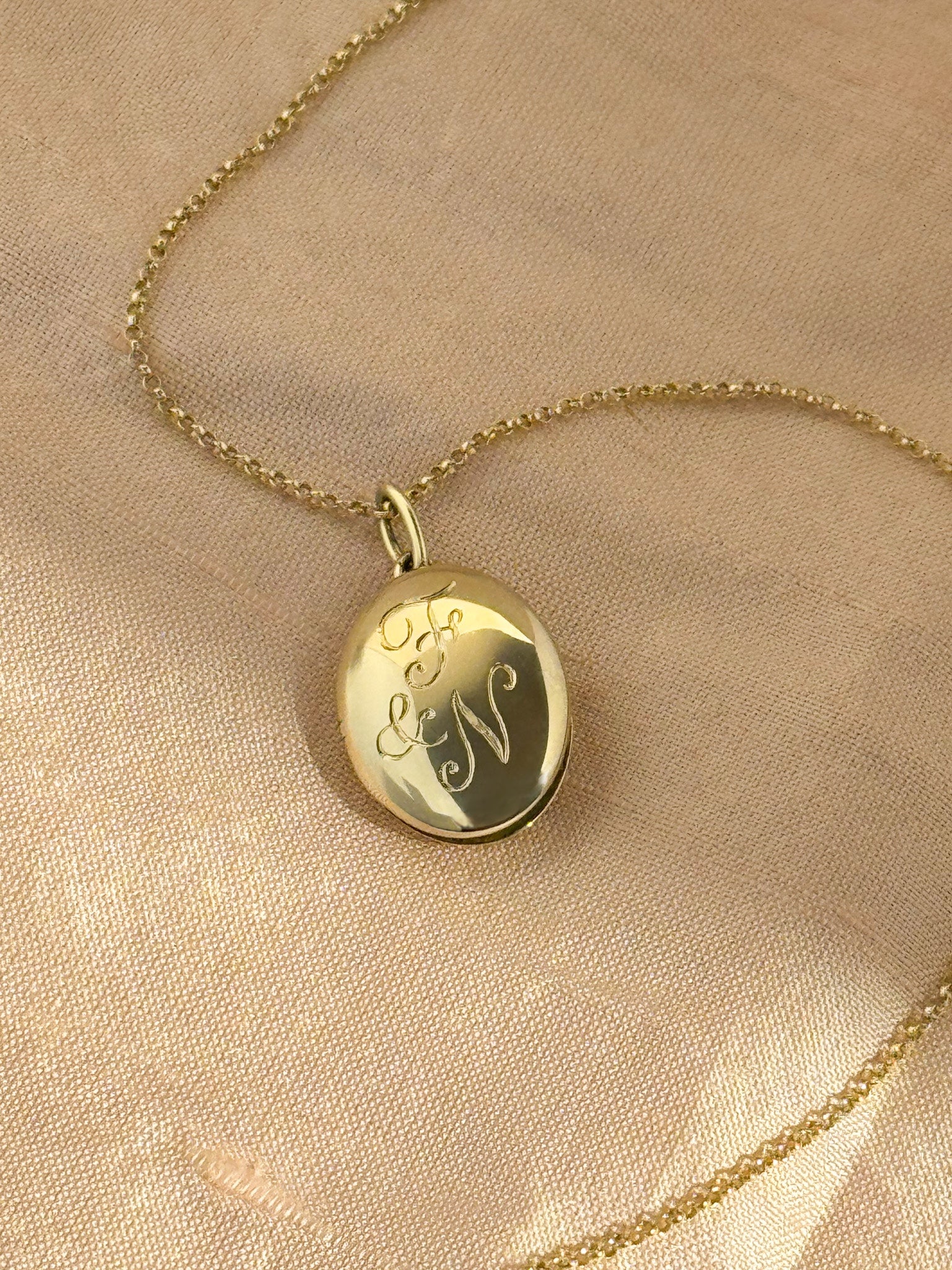 Hand engraved initial 9ct yellow gold locket