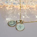 Traditionally hand engraved initial necklace in 9ct and 14ct yellow gold