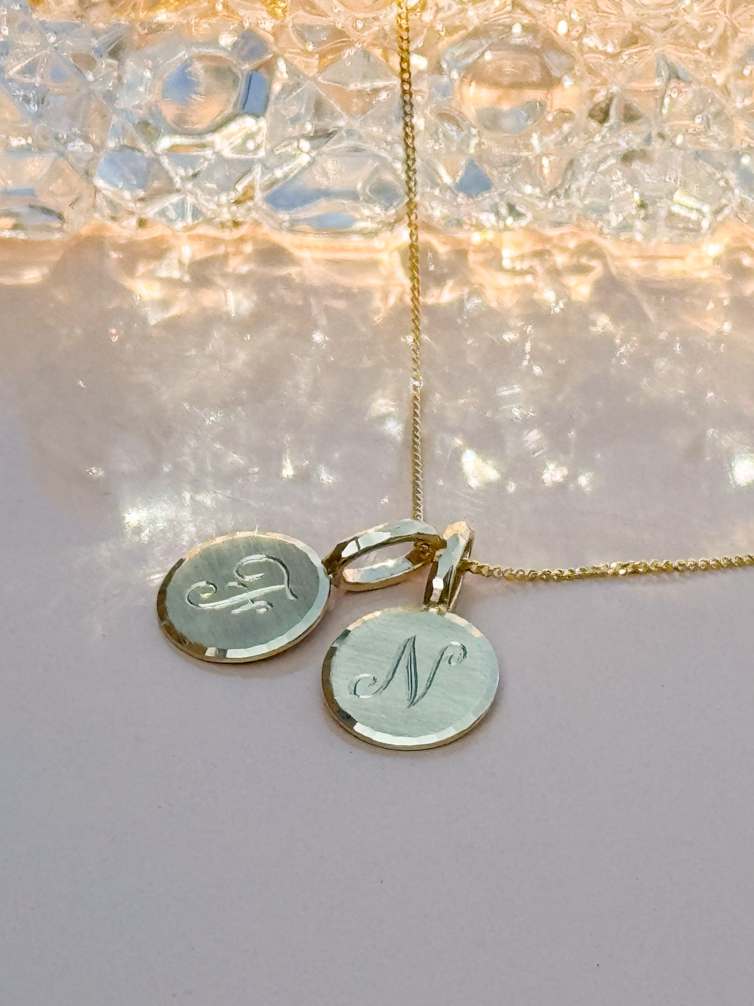 Traditionally hand engraved initial necklace in 9ct and 14ct yellow gold