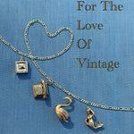 Charm necklace celebrating unique vintage jewellery