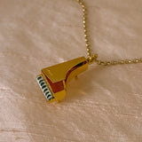 vintage gold piano charm necklace