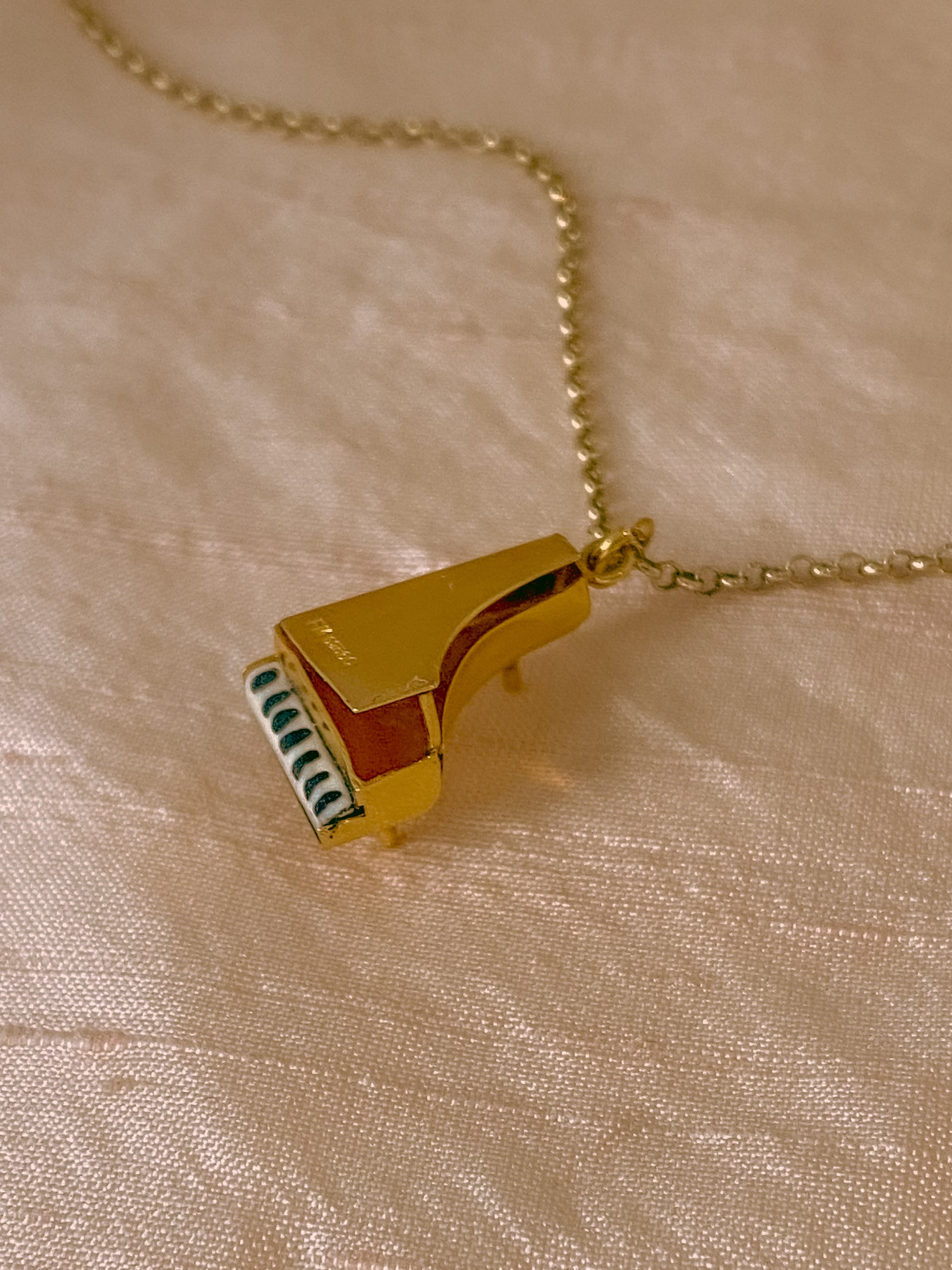 vintage gold piano charm necklace