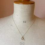 Unique necklace with vintage lamp charm