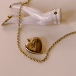 Everyday vintage locket in yellow gold