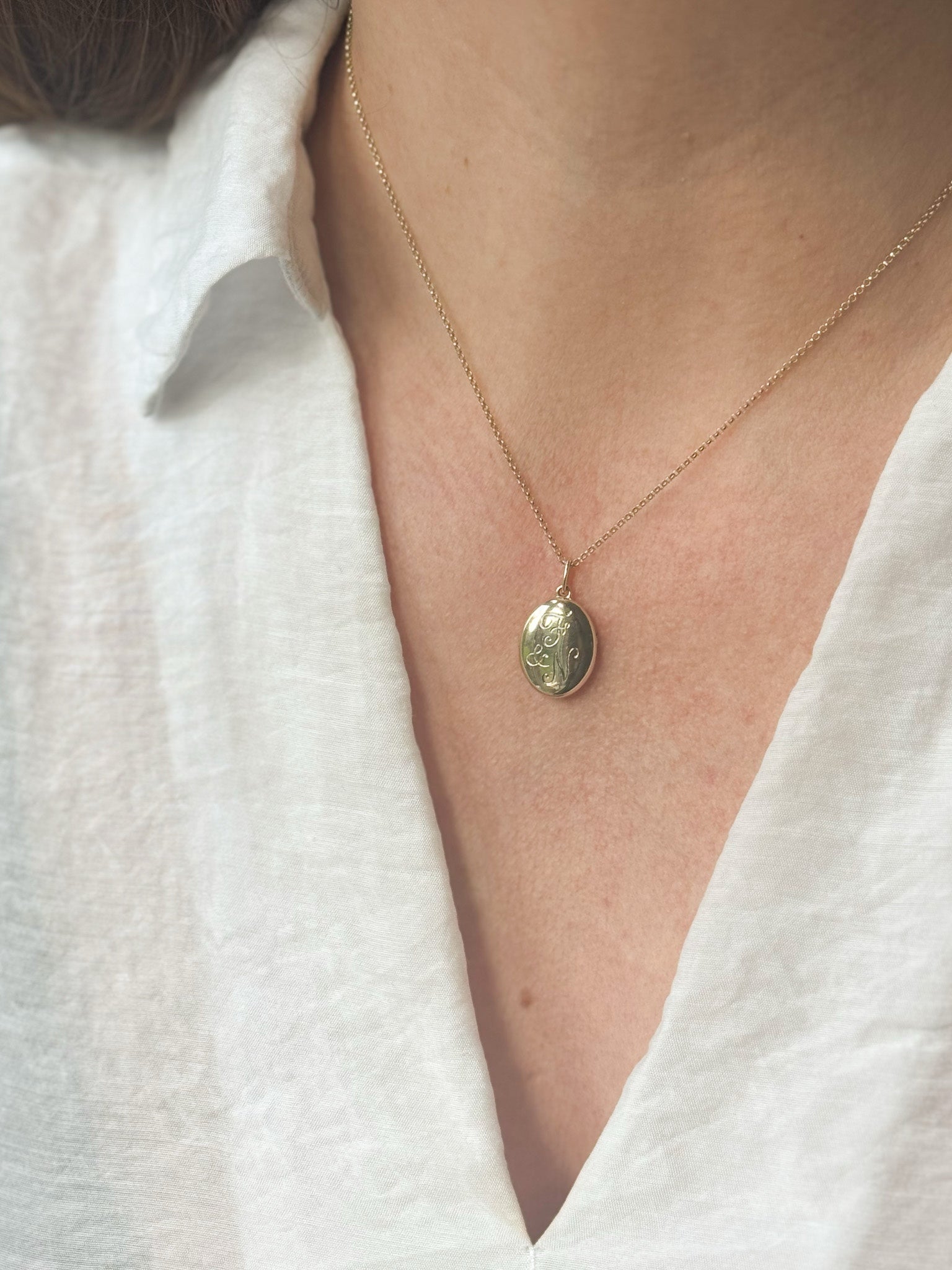 Initial engraved solid yellow gold locket