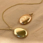 Custom made solid gold hand engraved locket