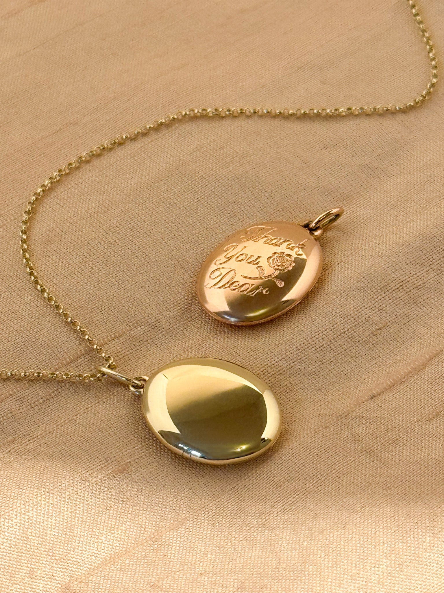 Custom made solid gold hand engraved locket