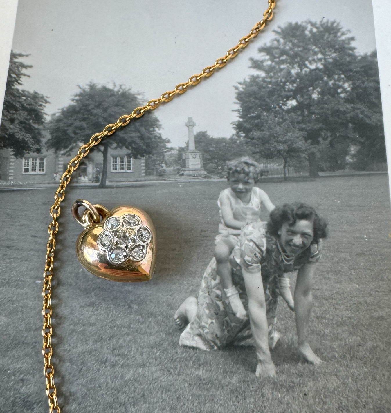 Antique gold diamond flower heart pendant