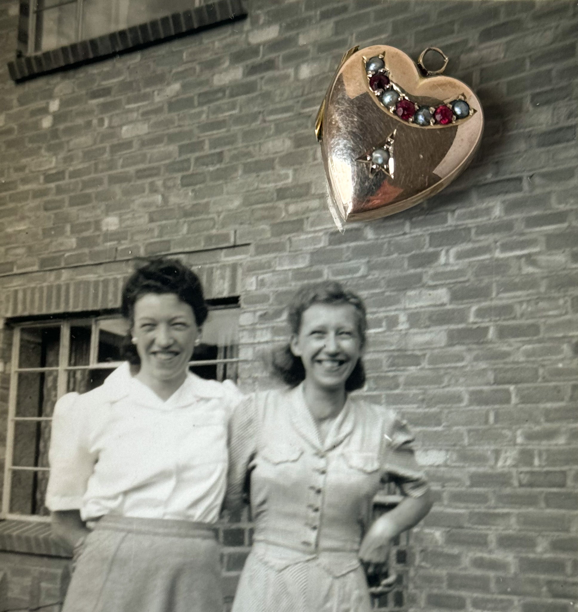Victorian heart locket with red stones and pearls
