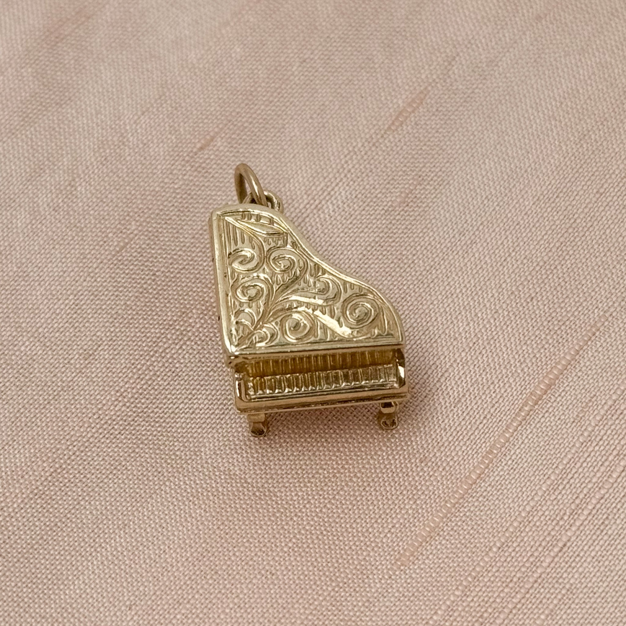 Beautifully detailed vintage jewelry charm