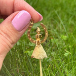 Unique Lucky gold charm with a Pixie on a horseshoe