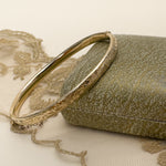 Hinged 9ct yellow gold antique bangle