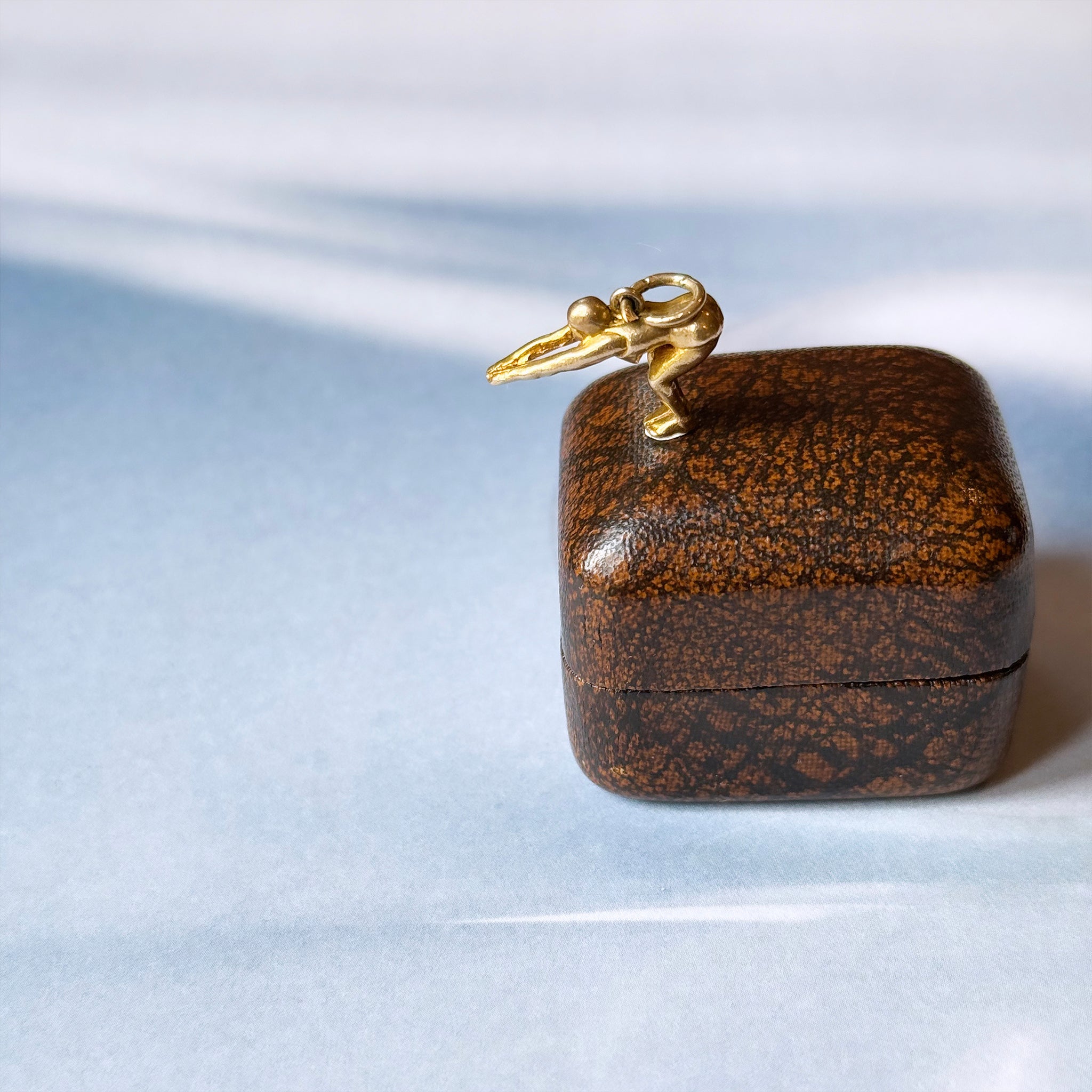 Gold swimmer charm 9ct gold