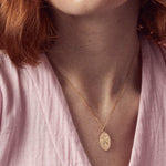 Treasured engraved solid gold pendant