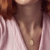 Treasured engraved solid gold pendant