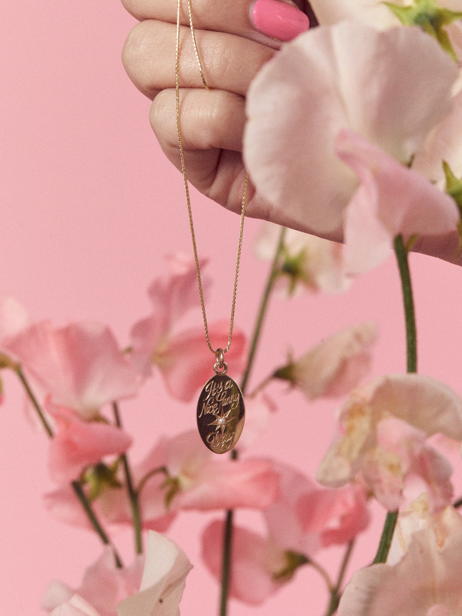 Hand engraved keepsake pendant charm in solid gold