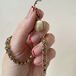 Everyday antique gold locket bracelet