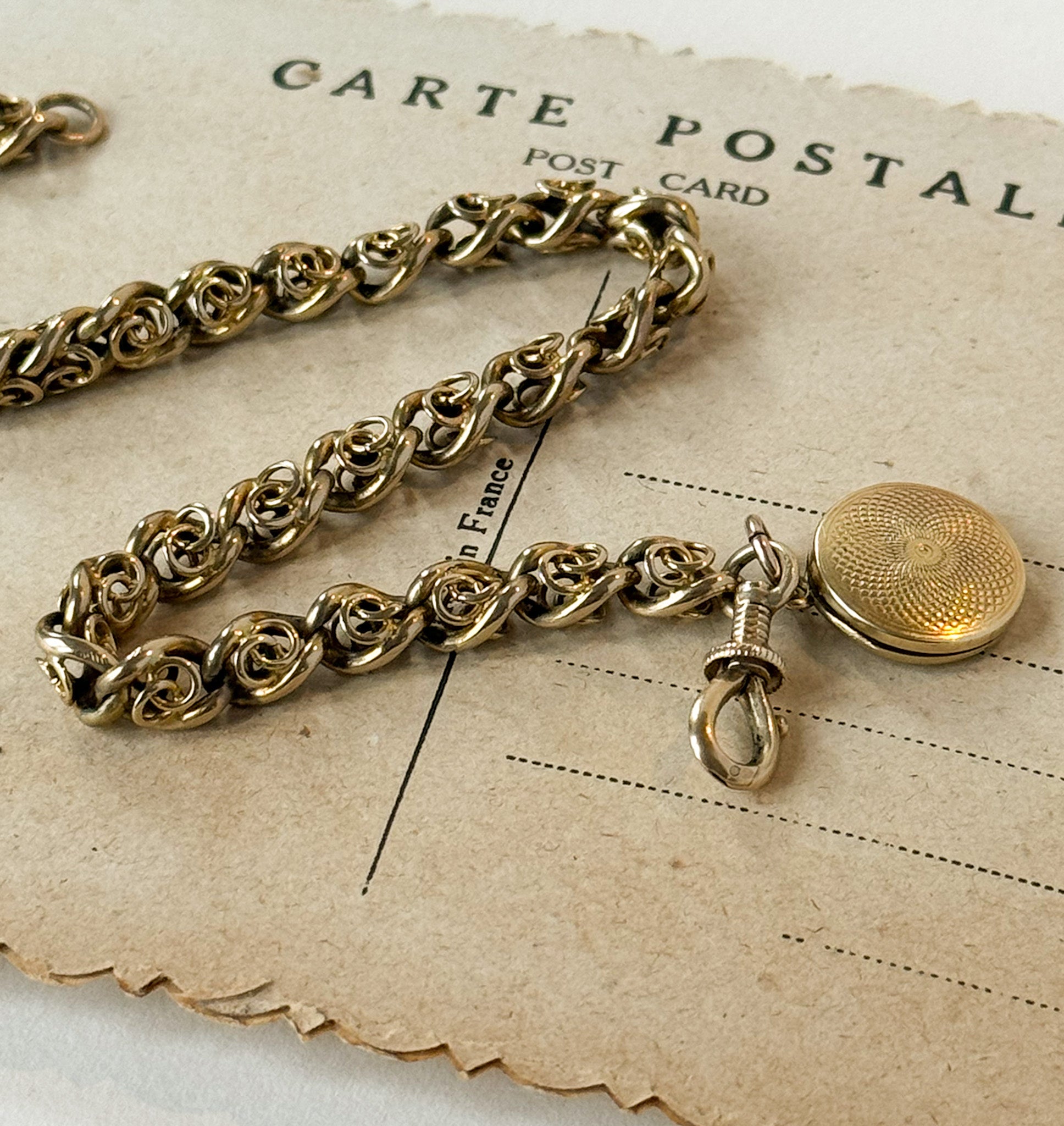 Unique 15ct and 9ct gold antique bracelet with a locket and swivel clasp 