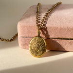 Swivel clasp 15ct antique locket 