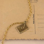 Gold vintage envelope charm 