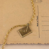 Gold vintage envelope charm 