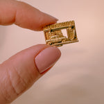 Vintage gold petrol station charm 