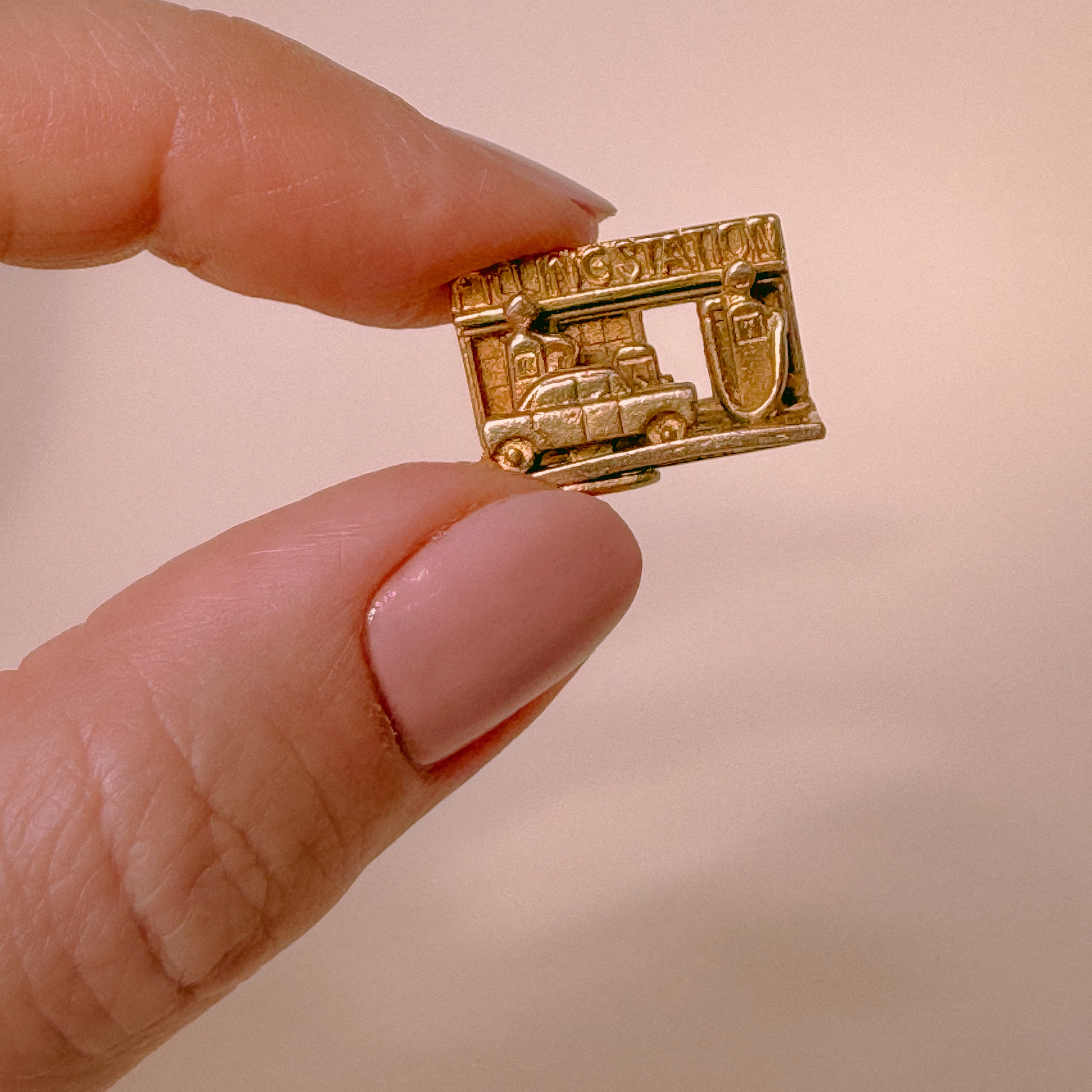 Vintage gold petrol station charm 