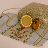 antique victorian locket holds two photographs 