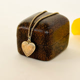 Edwardian floral engraved 9ct gold pendant 