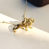 Finely detailed lion charm in 15ct gold 