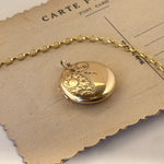Beautifully patterned vintage gold locket 
