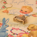 9ct yellow gold vintage baby crib charm 
