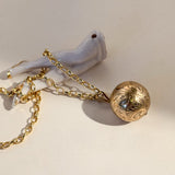Vintage round ball patterned locket in 9ct gold 