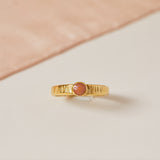 Coral rub over set stone ring 