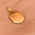 Unique solid gold locket with traditional hand engraving 