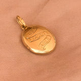 Unique solid gold locket with traditional hand engraving 