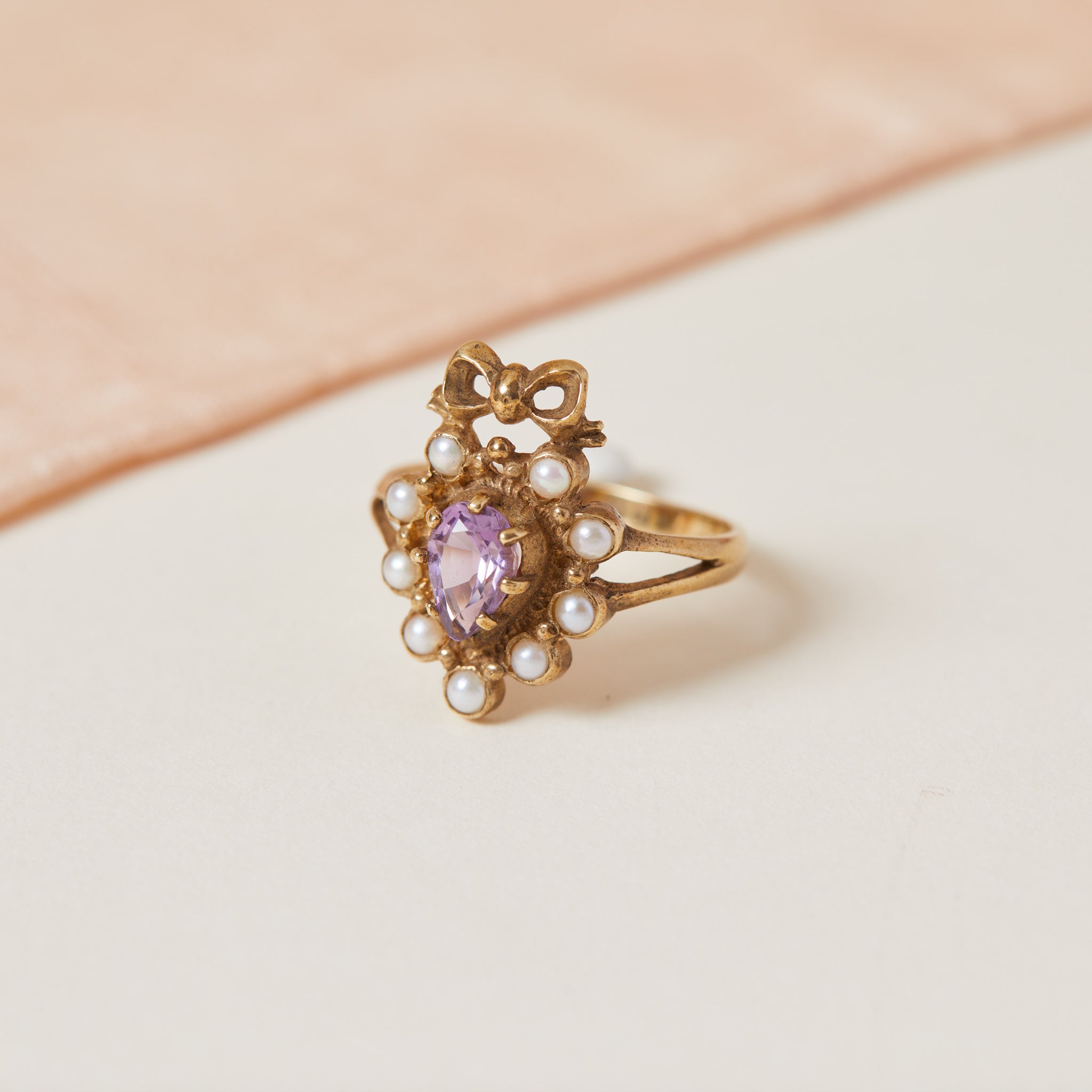 amethyst and pearl heart and bow gold ring 